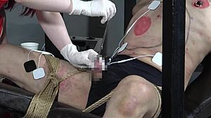 feel the japanese femdom mistress zap you with electric shock while she sounds your urethra with saliva dripping everywhere