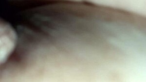 brunette squeezes fresh milk from her huge natural lactating tits